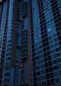Full frame of the condominium windows in big city